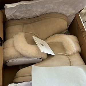 Womens UGG Size 9 brand new in box never worn.